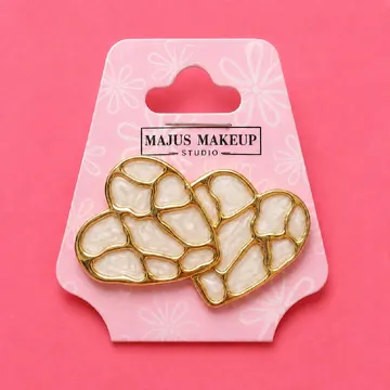 MAJUS ARETES FLOR Y CORAZON DORADOS